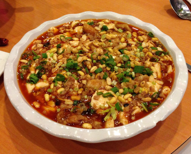 Pieces of fish fillet, which were served in a pie plate with soft tofu by Chengdu 23